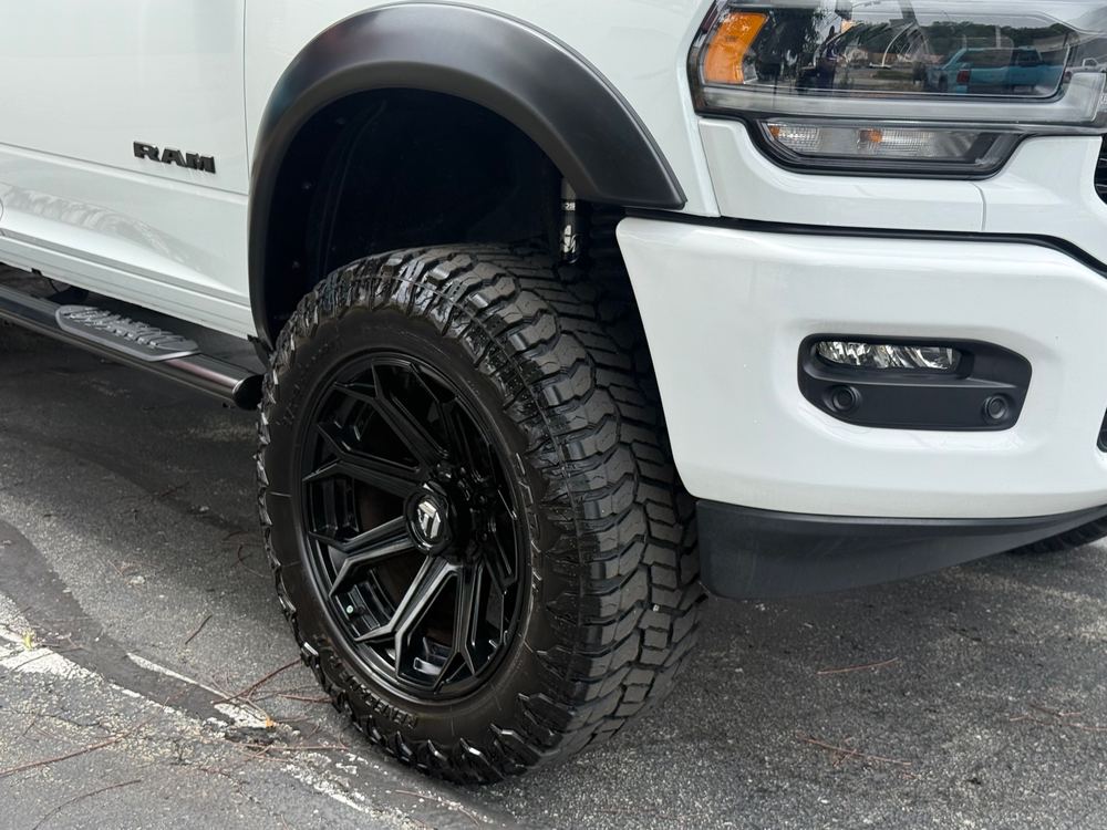 Black wheels, white RAM by In the Details Auto Spa, Allison Park