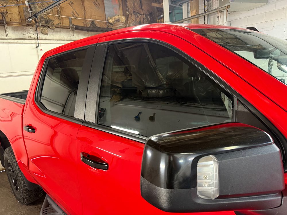 Red pickup, fresh tint by In the Details Auto Spa, Allison Park